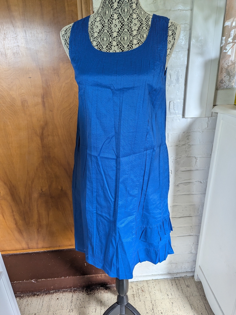 Sleeveless Blue A-Line Dress with Pleated Hem